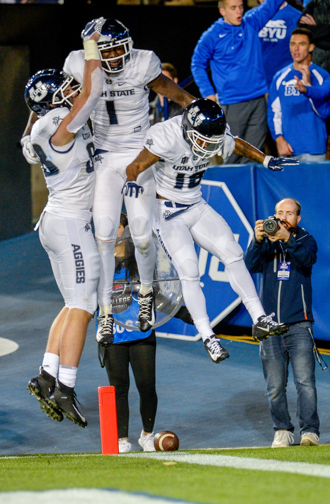 Leah Hogsten  |  The Salt Lake Tribune  The Aggies celebrate Utah State Aggies wide receiver Ron'quavion Tarver's  (1) touchdown in the third quarter as BYU hosts Utah State University at Lavell Edwards Stadium in Provo, Friday, Oct. 5, 2018.