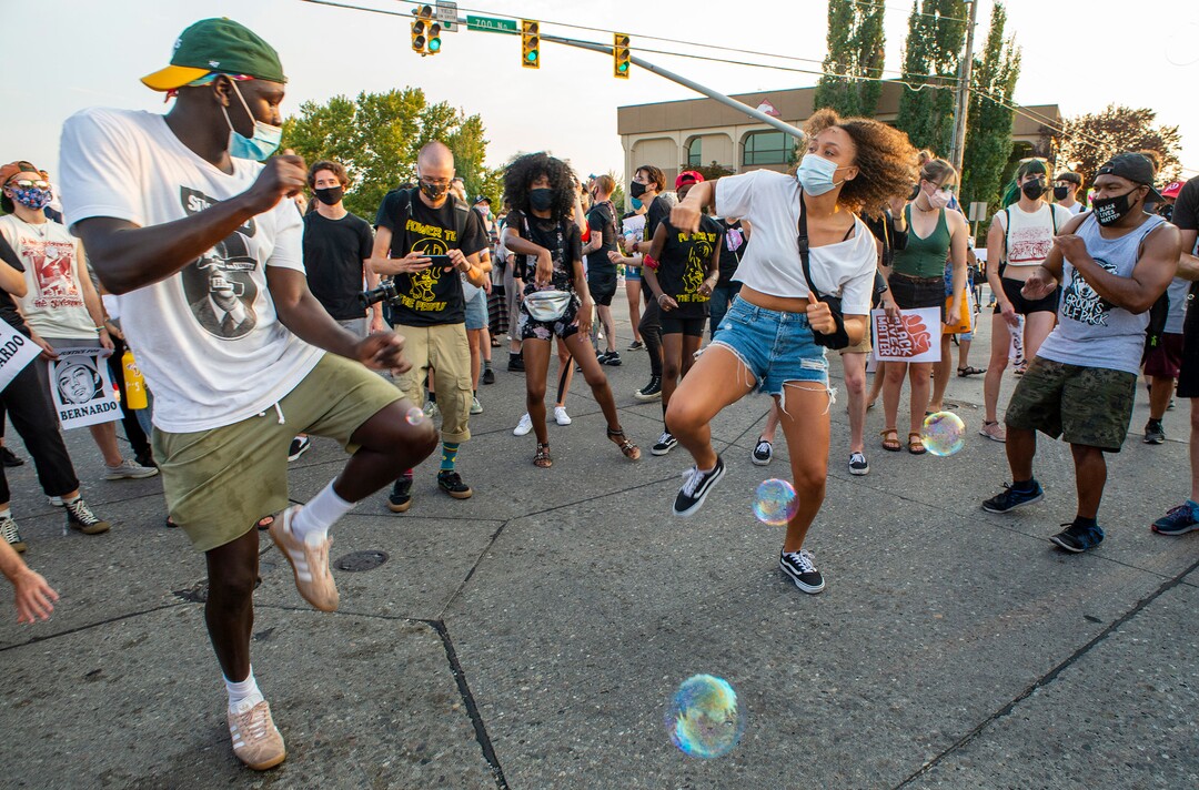 (Rick Egan  |  The Salt Lake Tribune)     Protesters stop on Redwood Road to dance, during the Dance Dance for Revolution protest in Rose Park on Sunday, Aug. 23, 2020. The protest was in memory of Jovany Mercardo who was shot last August by Ogden police by four officers, hitting his body sixteen times.