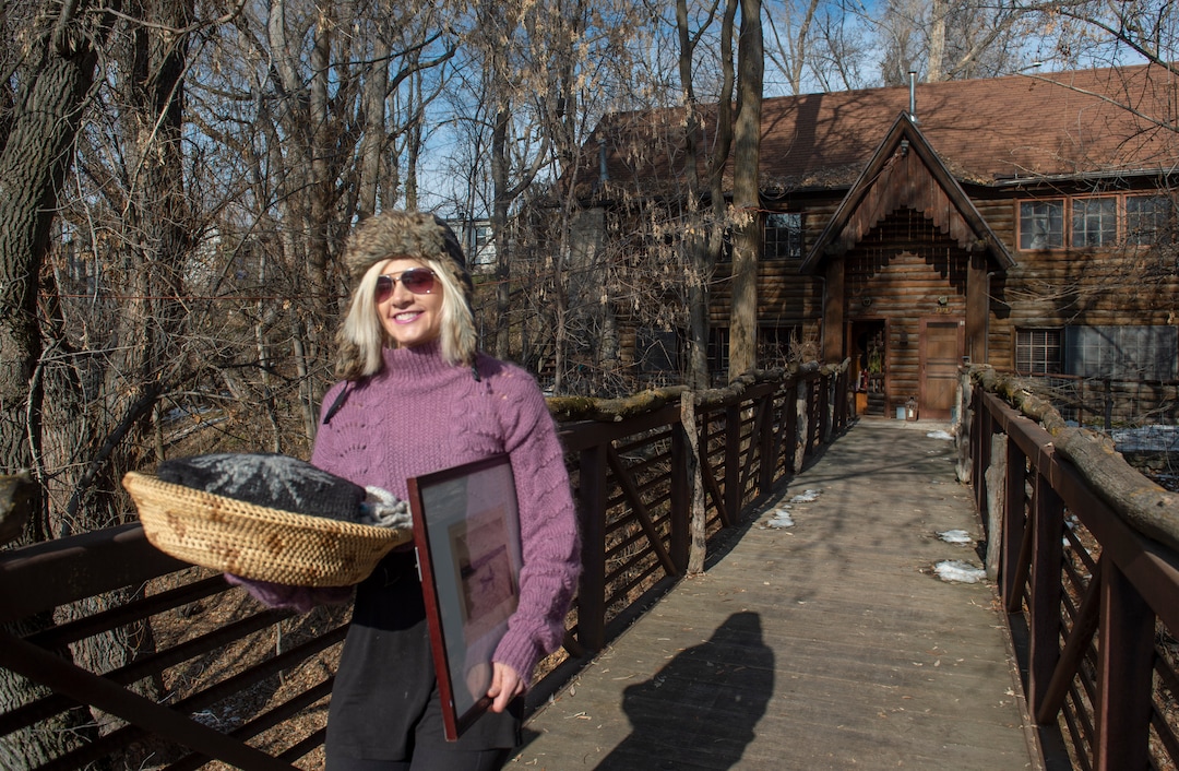 (Rick Egan  |  The Salt Lake Tribune)      Gretchen Graehl brings some of her belongings out of her house in Allen Park, which is closing, all residents have to be out by the end of the day today, Monday, Jan. 14, 2019.