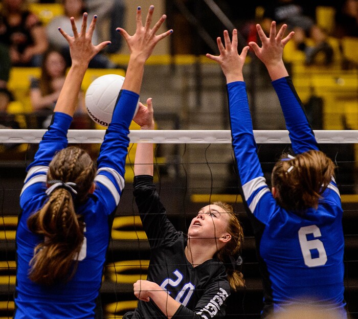 (Trent Nelson | The Salt Lake Tribune) Rich's Savannah Peart hits the ball as Panguitch defeats Rich in the 1A State Volleyball Championship game in Orem, Saturday October 28, 2017.