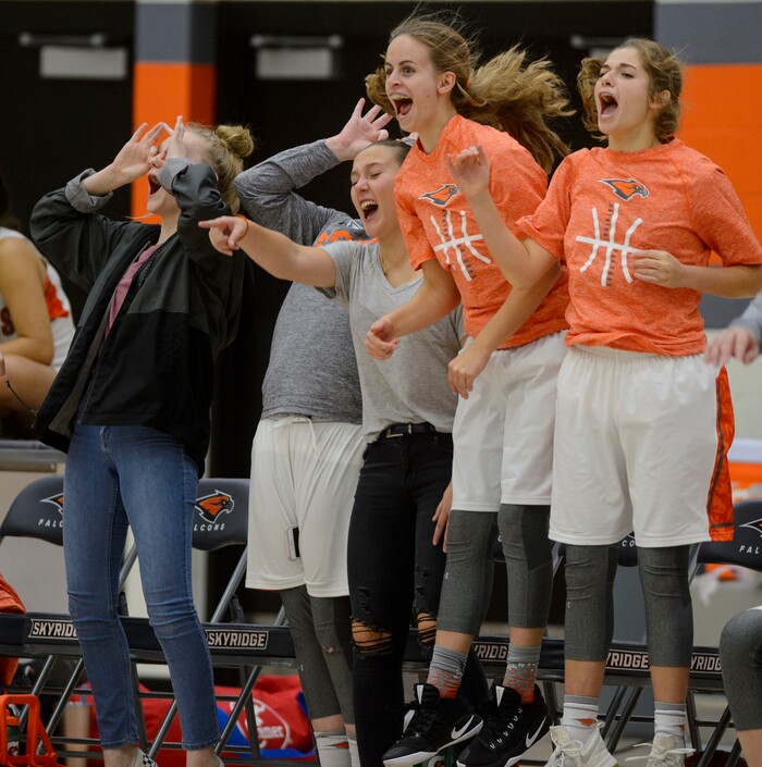 (Steve Griffin  |  The Salt Lake Tribune) The Skyridge bench goes crazy after the Falcons nailed a three-pointer late in the fourth quarter against Hillcrest at Skyridge High School in Lehi Wednesday December 13, 2017.