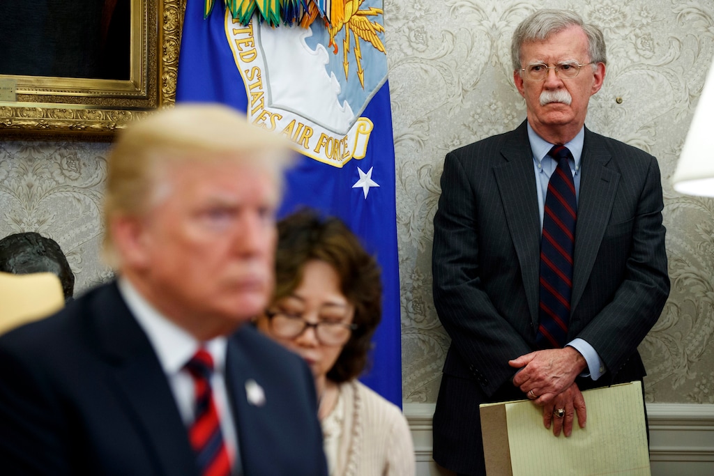 (Evan Vucci | AP file photo)
In this May 22, 2018, file photo, U.S. President Donald Trump, left, meets with South Korean President Moon Jae-In in the Oval Office of the White House in Washington, as national security adviser John Bolton, right, watches.