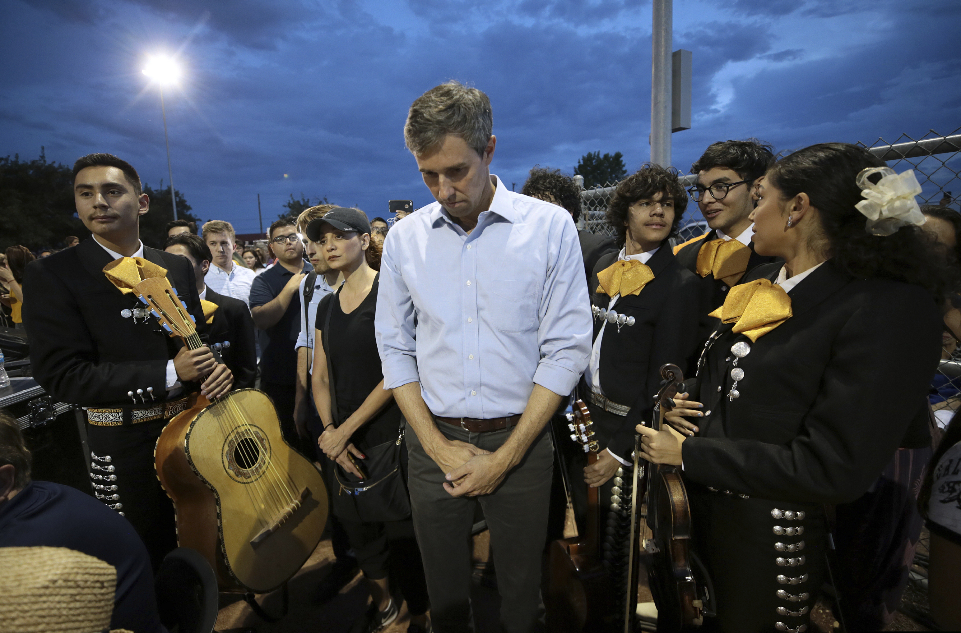 Presidential candidate and El Pasoan Beto O'Rourke prays during the Hope Border Institute prayer vigil Sunday, Aug. 4, 2019 in El Paso, Texas, a day after a mass shooting at a Walmart store. (Mark Lambie/The El Paso Times via AP)