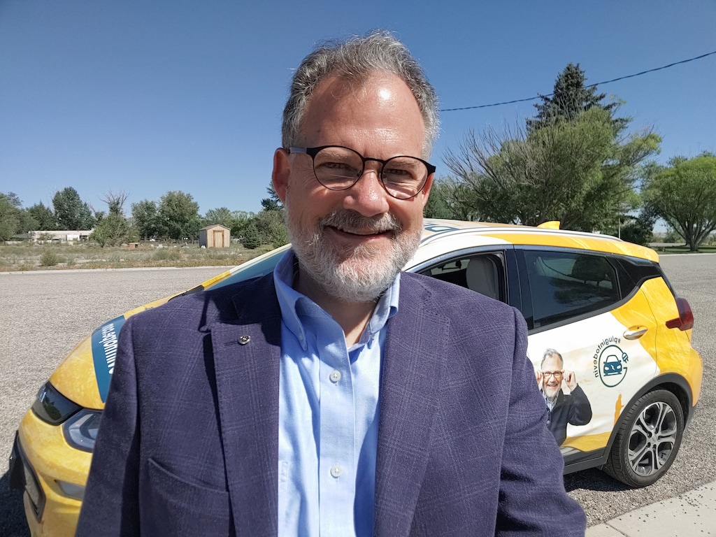 (Courtesy Photo) Democrat Devin Thorpe drove an electric car around the 3rd District during his 2020 campaign for Congress.