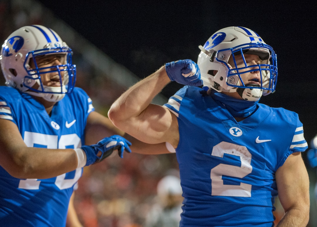 (Rick Egan  |  The Salt Lake Tribune)        Brigham Young Cougars offensive lineman Jacob Jimenez (70) celebrates as Brigham Young running back Matt Hadley (2) scores a touchdown for the Cougars, in football action between the Brigham Young Cougars and the Utah Utes, at Rice-Eccles Stadium, Saturday, November 24, 2018.