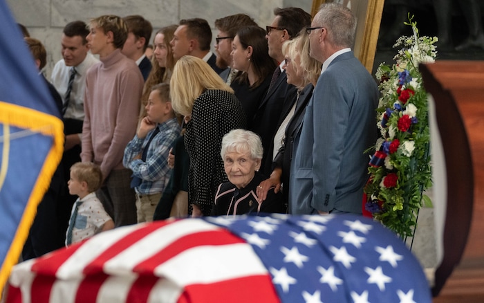 (Francisco Kjolseth | The Salt Lake Tribune) Elaine Hatch looks over at the casket carrying her husband, former U.S. Sen. Orrin Hatch, during a public viewing at the Utah Capitol on Wednesday, May 4, 2022. Hatch, the longest-serving Republican senator in U.S. history and the longest-serving from Utah, died April 23 at age 88.