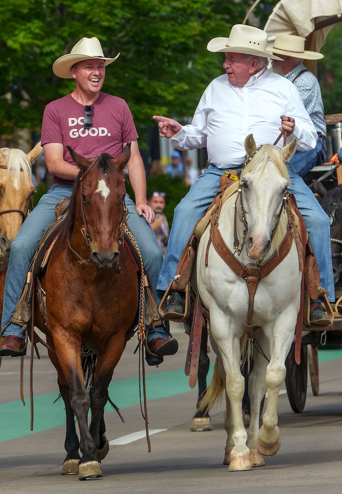 (Leah Hogsten | The Salt Lake Tribune) To kick off the start of Utah's Days of '47 rodeo week, Governor Spencer Cox, First Lady Abby Cox and working ranglers drove a herd of longhorn cattle from the heart of Salt Lake City to the  Utah Fair Park, Tuesday, July 19, 2022.