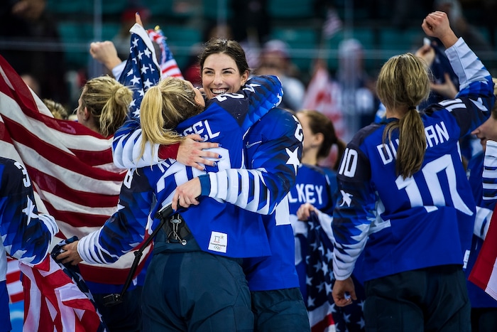 (Chris Detrick  |  The Salt Lake Tribune) United States forward Amanda Kessel (28) and United States forward Hilary Knight (21) hug after winning the Women's Gold Medal Game at Gangneung Hockey Centre during the Pyeongchang 2018 Winter Olympics Thursday, Feb. 22, 2018. United States defeated Canada 3-2 in a shootout victory. 