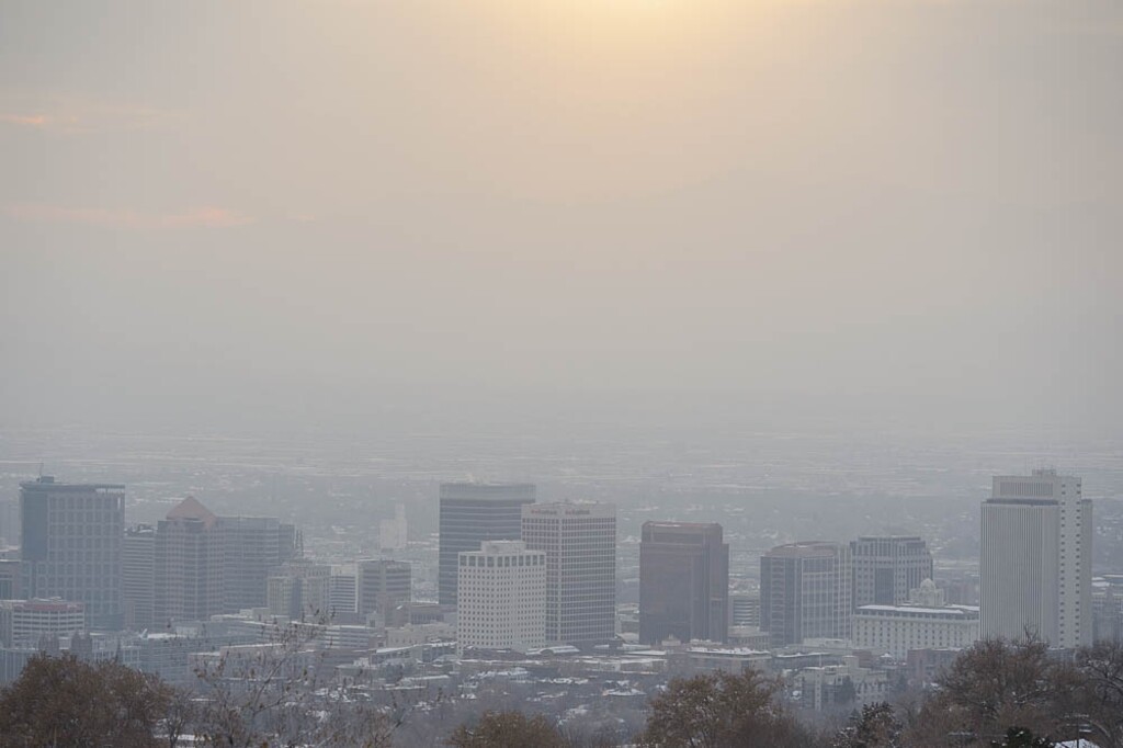 (Trent Nelson | Tribune file photo)  The Salt Lake City skyline on a hazy day, Thursday, Dec. 6, 2018.