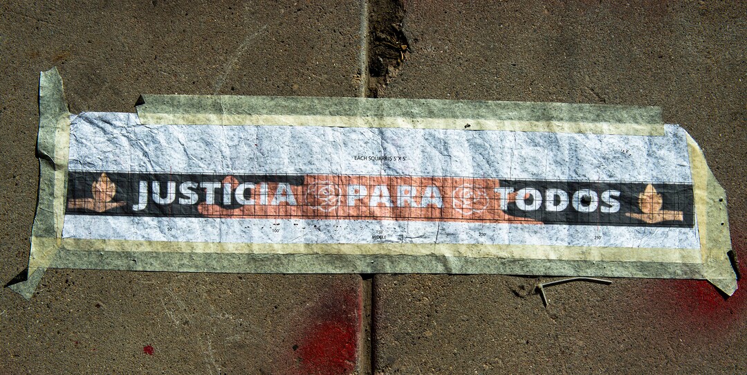 (Rick Egan  |  The Salt Lake Tribune)     Artists painted “Justicia Para Todos” on Main Street in Park City over the weekend, Monday, July 6, 2020.