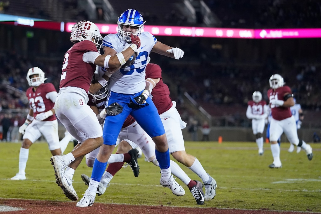 BYU tight end Isaac Rex (83) scores a touchdown against Stanford during the first half of an NCAA college football game in Stanford, Calif., Saturday, Nov. 26, 2022. (AP Photo/Godofredo A. Vásquez)