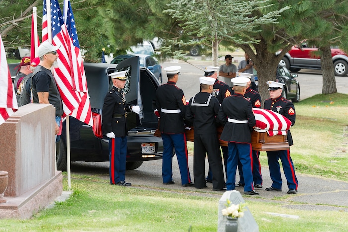 (Alex Gallivan  |  Special to the Tribune) Members of the Marine Corp Honor Guard receive the body of Marine Pfc. Robert K. Holmes, who died 77 years ago aboard the USS Oklahoma during the attack on Pearl Harbor, is laid to rest in the Salt Lake City Cemetery, Monday, Aug. 20, 2018.