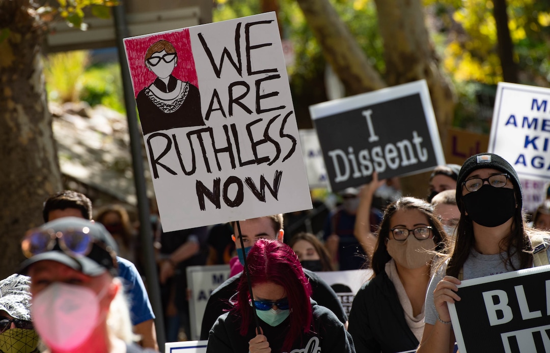 (Francisco Kjolseth  |  The Salt Lake Tribune) Demonstrators gather in Salt Lake City, uniting with Women’s March rallies happening in Washington D.C. and around the country on Saturday, Oct. 17, 2020, to signal their opposition to President Donald Trump and his agenda, including his push to fill the seat of late Supreme Court Justice Ruth Bader Ginsburg before election day.