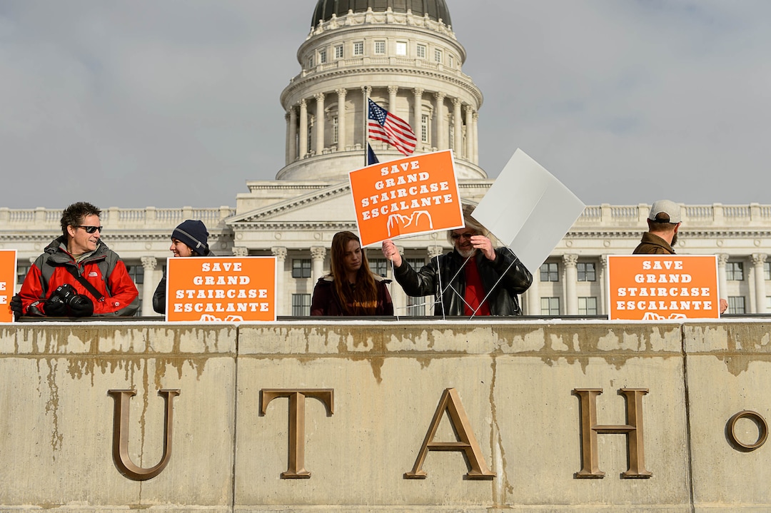 (Trent Nelson | The Salt Lake Tribune)  Protesters gather before a visit by President Donald Trump, Monday December 4, 2017.