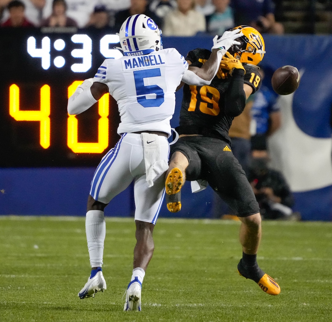 (Francisco Kjolseth | The Salt Lake Tribune) Brigham Young Cougars defensive back D'Angelo Mandell (5) breaks up a pass intended for Arizona State Sun Devils wide receiver Ricky Pearsall (19) in football action between the Brigham Young Cougars and the Arizona State Sun Devils at LaVell Edwards Stadium in Provo, on Saturday, Sept. 18, 2021.