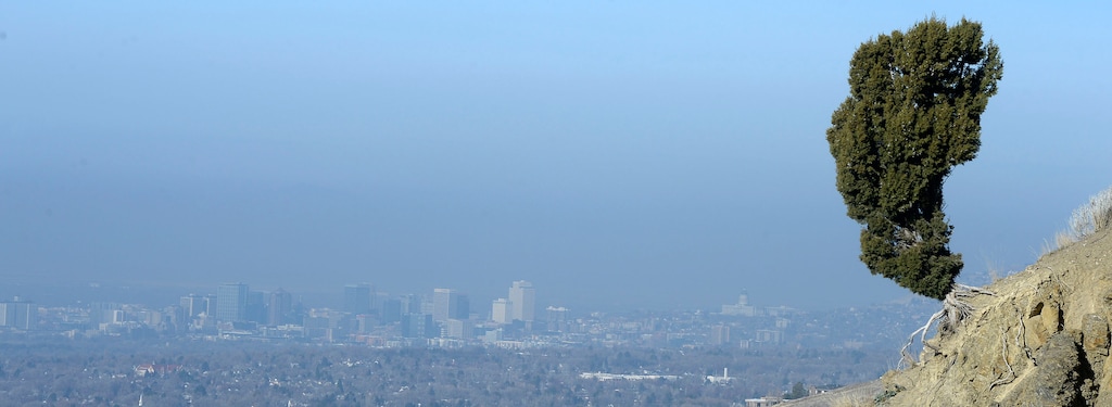 (Al Hartmann  |  The Salt Lake Tribune) Downtown Salt Lake City was visible (just barely) from the foothills east of the city Friday Dec. 15.  The air quality is better than earlier in the week after a weak storm front blew in.