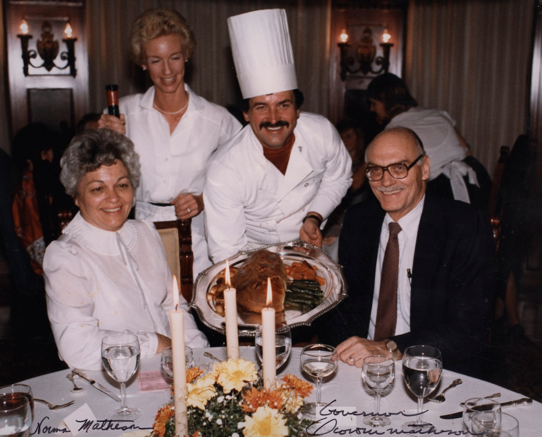 (Tribune file photo) Former Govenor Scott Matheson and his wife Norma are served by Max Mercier and his wife Katie at La Parisien some time around 1980. 