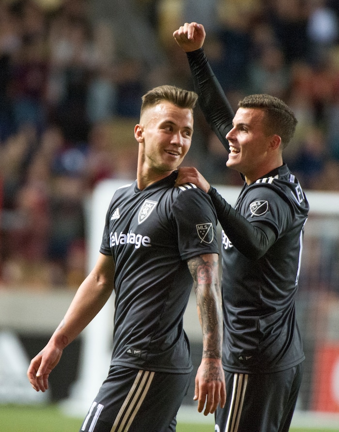 (Rick Egan  |  The Salt Lake Tribune)     Real Salt Lake forward Brooks Lennon (12) celebrates the goal by Real Salt Lake midfielder Albert Rusnak (11) late in the game, in MLS soccer action, between Real Salt Lake and Colorado Rapids,  at Rio Tinto Stadium, Saturday, April 21, 2018.


