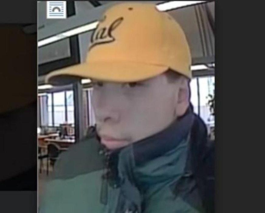 (Photo courtesy FBI) The FBI has released this bank surveillance photo of a man, dubbed "The Holiday Bandit," suspected of committing seven bank robberies between Nov. 20 and Dec. 28. This photo was taken Christmas Eve at the US Bank branch at 5352 S. 4015 West in Kearns.