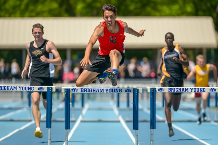 (Leah Hogsten | The Salt Lake Tribune) Bountiful's Jace Jensen advances to the finals after a time of 39.10 in the 5A Boys' 300 Meter Hurdles at the 2018 Utah UHSAA State Track and Field Championships at Clarence Robison Track on the campus of Brigham Young University in Provo, Thursday, May 17, 2018.