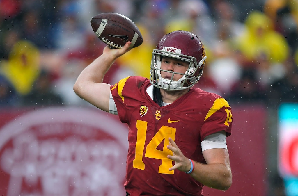 Southern California quarterback Sam Darnold passes during the first half of an NCAA college football game against Notre Dame, Saturday, Nov. 26, 2016, in Los Angeles. (AP Photo/Mark J. Terrill)