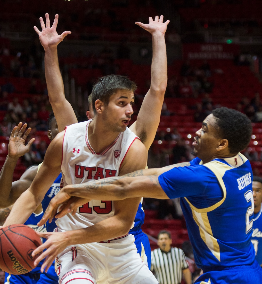 (Rick Egan  |  The Salt Lake Tribune)    Utah Utes forward Novak Topalovic (13) tries to pass the ball, as Tulsa guard DaQuan Jeffries (2) defends for the Golden Hurricane's,  in basketball action between, Utah Utes and Tulsa Golden Hurricane, at the Jon M. Huntsman Center, Saturday, Dec. 1, 2018.