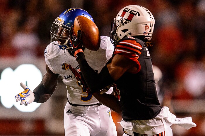 (Trent Nelson | The Salt Lake Tribune) Utah Utes wide receiver Darren Carrington II (9) reaches for the ball but San Jose State Spartans cornerback Jermaine Kelly (3) is called for pass interference as the Utah Utes host the San Jose State Spartans, NCAA football at Rice-Eccles Stadium in Salt Lake City, Saturday September 16, 2017.