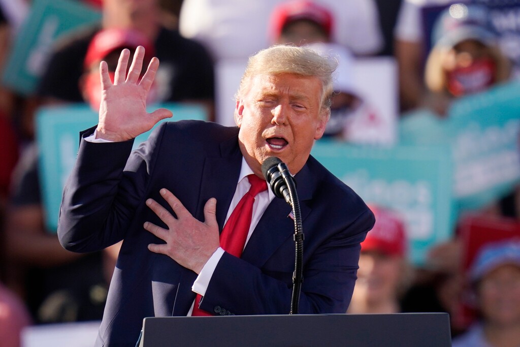 (Ross D. Franklin | AP photo)

 Donald Trump gestures as he talks about Democratic presidential candidate former Vice President Joe Biden as he speaks at a campaign rally Monday in Tucson, Ariz.