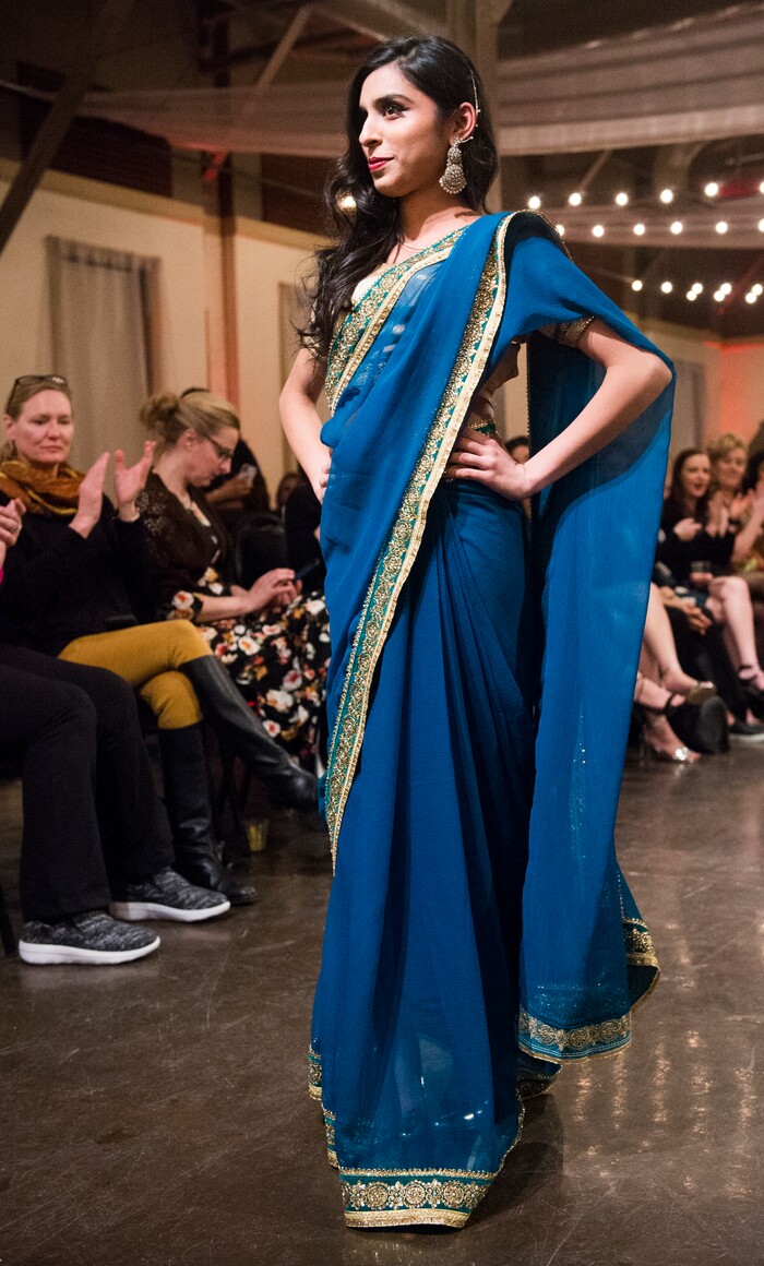 (Rick Egan  |  The Salt Lake Tribune)  Mesha  models a dress from Pakistanat the 8th Annual Women of the World Fashion Show. The fashion show fund is raiser for the non-profit that seeks to help refugees settle in a new culture. Wednesday, March 7, 2018.