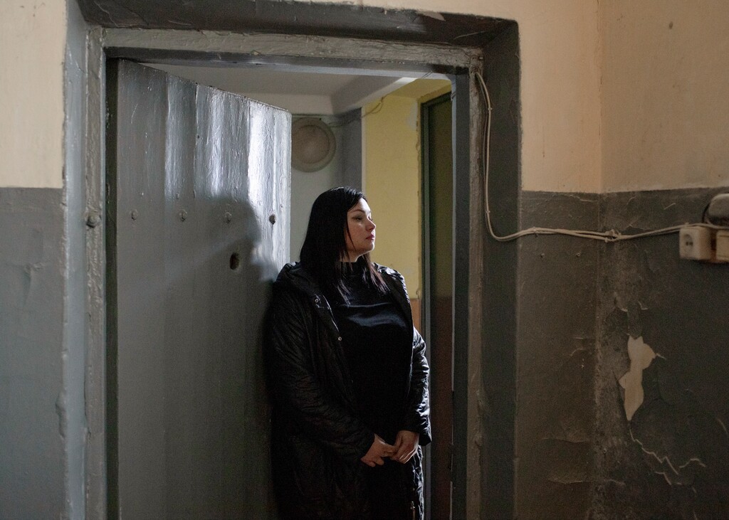 (Emile Ducke | The New York Times)
Albina Strelets stands in the holding cell of a police station in Balakliya, Ukraine where she had been held captive by Russian forces during their occupation of the town, on Nov. 4, 2022. “I really wanted this area to be liberated,” said Strelets, who was detained after she transmitted information to the Ukrainian side.