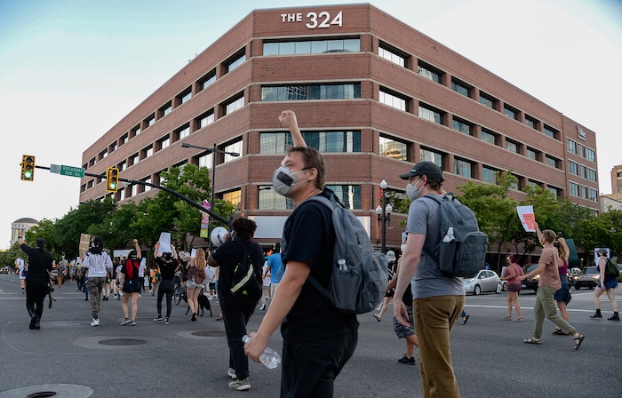 (Francisco Kjolseth  |  The Salt Lake Tribune) Protesters march the streets of downtown Salt Lake City to rally against police brutality on Friday, June 26, 2020.