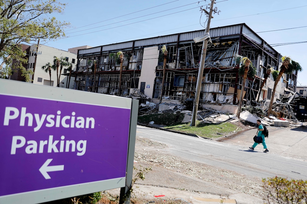 (David Goldman  |  AP Photo)  This Oct. 11, 2018, file photo shows a building at the Bay Medical Center Sacred Heart hospital damaged from hurricane Michael in Panama City, Fla. Medical services in the Florida Panhandle are still on life support more than a week after Hurricane Michael. The two major hospitals in Panama City, Bay Medical and Gulf Coast Regional Medical Center, still aren't admitting patients. They are only open for emergency room services.