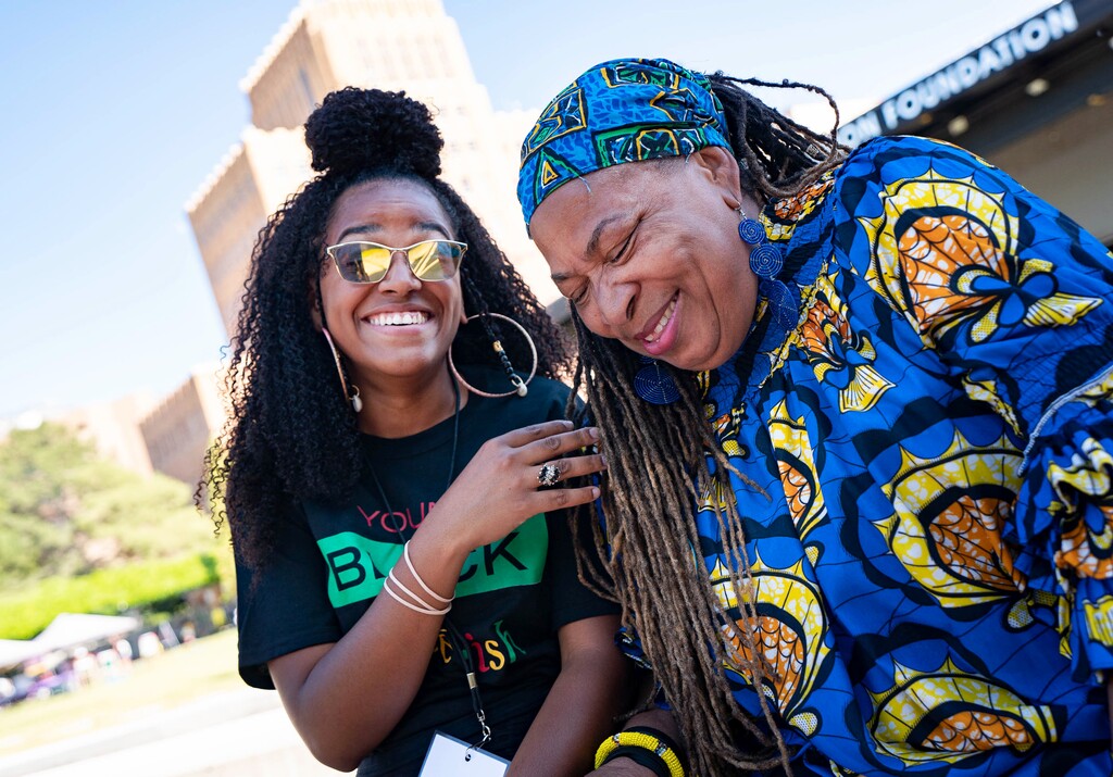 (Francisco Kjolseth | The Salt Lake Tribune) Nailah Mansa, volunteer coordinator for the Juneteenth Planning Commission joins Betty Sawyer, Director of Project Success Coalition Ogden as they take a brief break to catch their breath during the 32nd Annual Utah Juneteenth Festival and Holiday Commemoration at the Ogden Amphitheater on Saturday, June 19, 2021. Sawyer exclaimed “this has been a twenty year journey for me to pass this nationally, and it feels great.” 