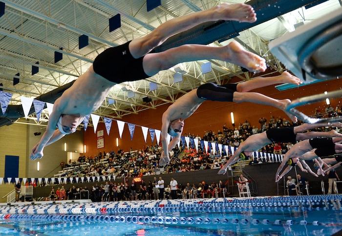 (Francisco Kjolseth | The Salt Lake Tribune) Men compete in the 50 Yard Free at the high school swimming 5A State Championships in Bountiful, Friday February 9, 2018.