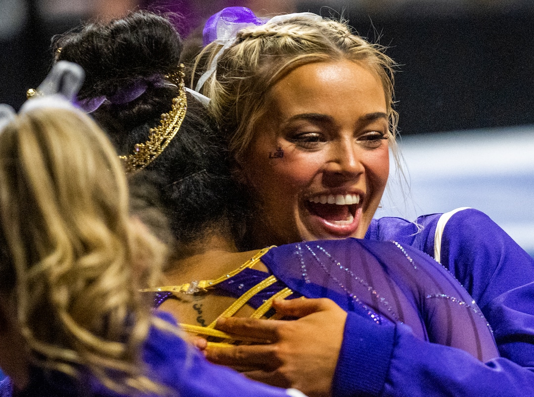(Rick Egan | The Salt Lake Tribune)  LSU gymnast Livvy Dunne hugs Konnor McClain, during a gymnastics meet between Utah, LSU, Oklahoma and UCLA at the Maverik Center, on Saturday, Jan. 13, 2024.