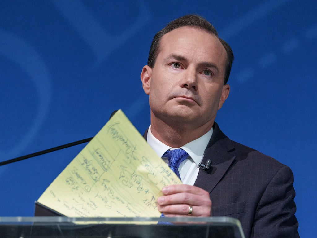 (Leah Hogsten | The Salt Lake Tribune) Sen. Mike Lee flips through notes during a debate at Utah Valley University, Oct. 17, 2022, ahead of the November midterm election.