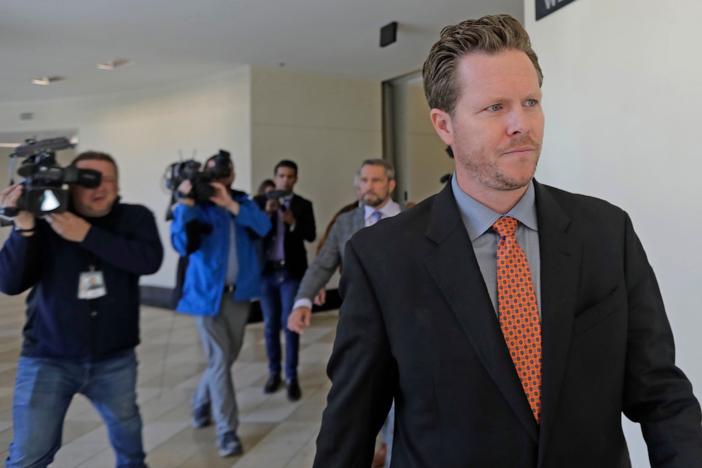 (Rick Bowmer | AP file photo) In this Nov. 15, 2019, file photo, Paul Petersen, an Arizona elected official accused of running a multi-state adoption scheme, leaves court following an initial appearance on charges filed in the state in Salt Lake City. Petersen filed a motion Monday, Nov. 25, 2019, asking the U.S. District Court in Fayetteville, Ark., to delay his trial for 10 months.