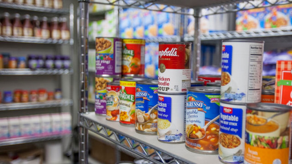 (Jude Macher  |  Salt Lake Community College) Cans line the shelves at the University of Utah’s Feed U pantry — one of several facilities providing food to college students in need in Salt Lake City.
