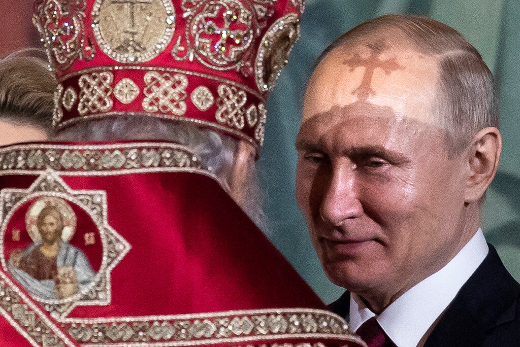 (Alexander Zemlianichenko | The Associated Press) Russian Orthodox Patriarch Kirill, left, talks to President Vladimir Putin, right, during the Easter service in the Christ the Savior Cathedral in Moscow, Russia, Sunday, April 28, 2019.
