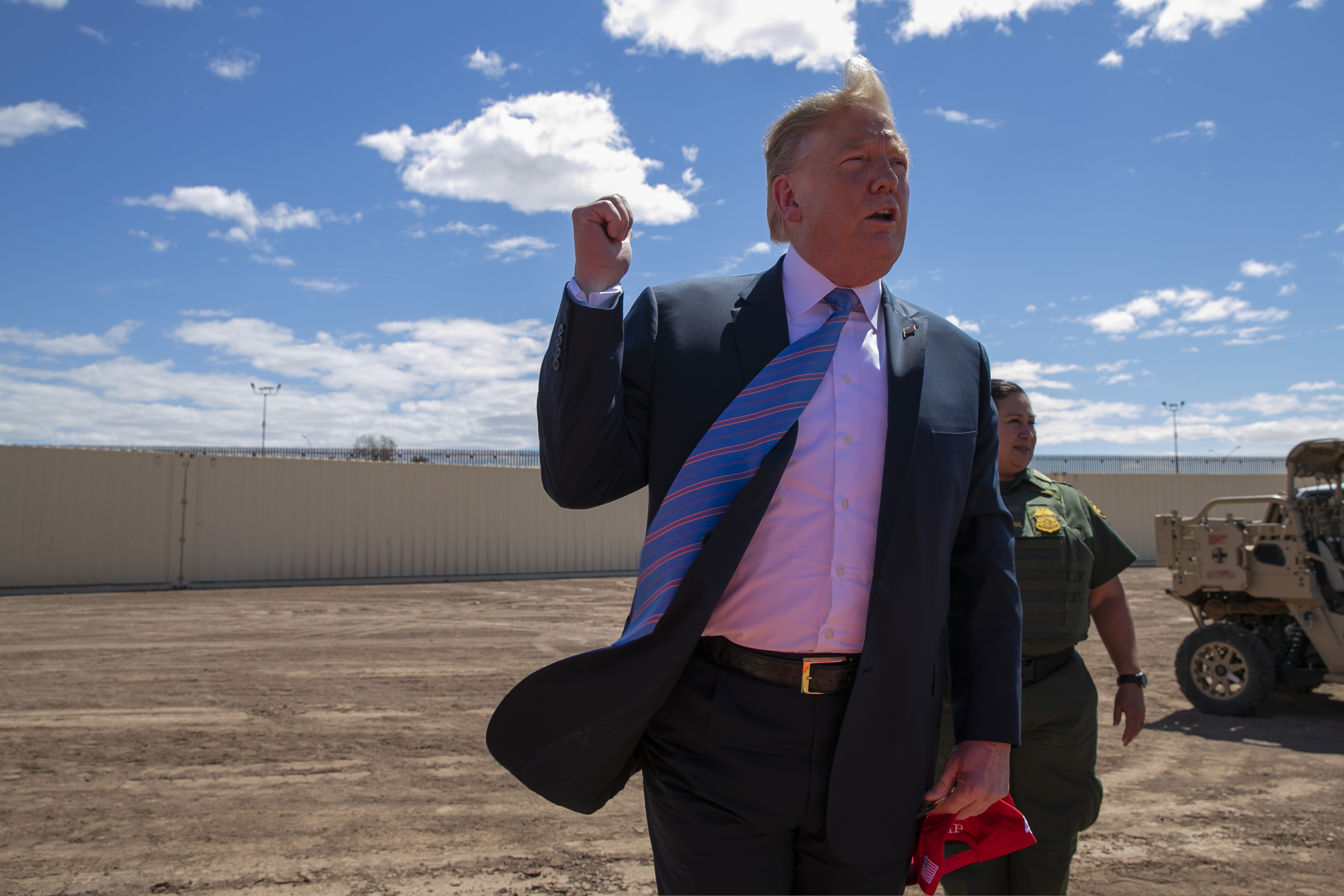 (AP Photo/Jacquelyn Martin) President Donald Trump speaks as he visits a new section of the border wall with Mexico in Calexico, Calif., Friday April 5, 2019.