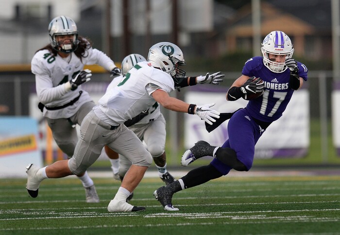 (Scott Sommerdorf   |  The Salt Lake Tribune)   Lehi's Jaxson Harward runs after a catch during first half play. Lehi led Olympus 26-0 late in the second half, Friday, September 22, 2017.