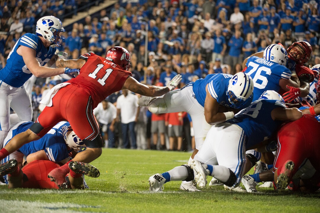 (Rick Egan  |  The Salt Lake Tribune)  Cougar running back Ula Tolutau (5) runs up the middle for a BYU touchdown, in football action BYU vs Utah, at Lavell Edwards Stadium in Provo, Saturday, September 9, 2017.