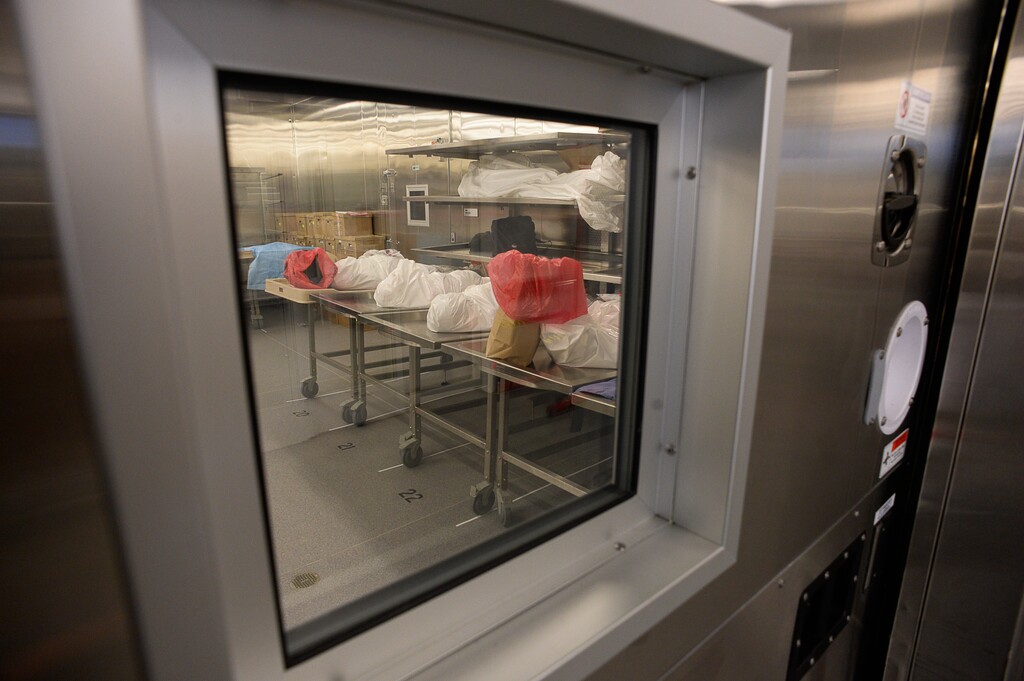 (Francisco Kjolseth | The Salt Lake Tribune) Bodies being processed through the new State Crime Lab in Taylorsville are held in one of two large coolers on Thursday, May 1, 2017. Housing the Utah State Medical Examiner's Office and the Department of Agriculture the new building features a ballistics firing range, vehicle processing bays, trace evidence labs, chemistry labs and a robotic DNA testing lab.