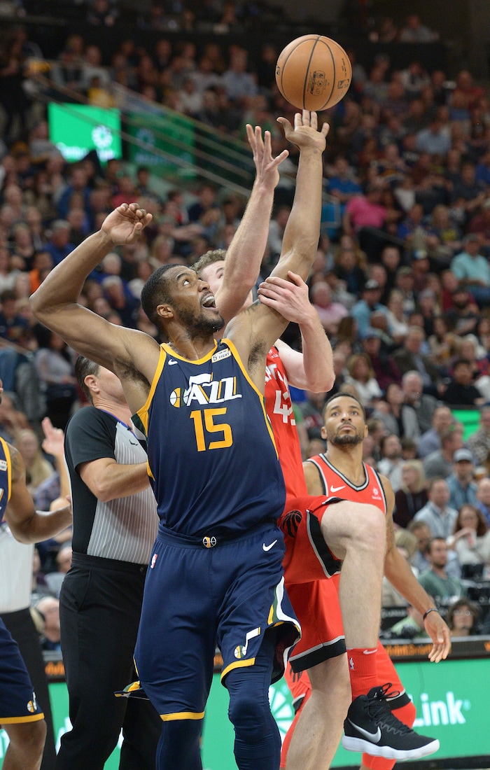 (Leah Hogsten  |  The Salt Lake Tribune) Utah Jazz forward Derrick Favors (15) battled Toronto Raptors center Jakob Poeltl (42). The Utah Jazz were defeated by the Toronto Raptors 100-109 at Vivint Smart Home Arena, Friday, November 3, 2017