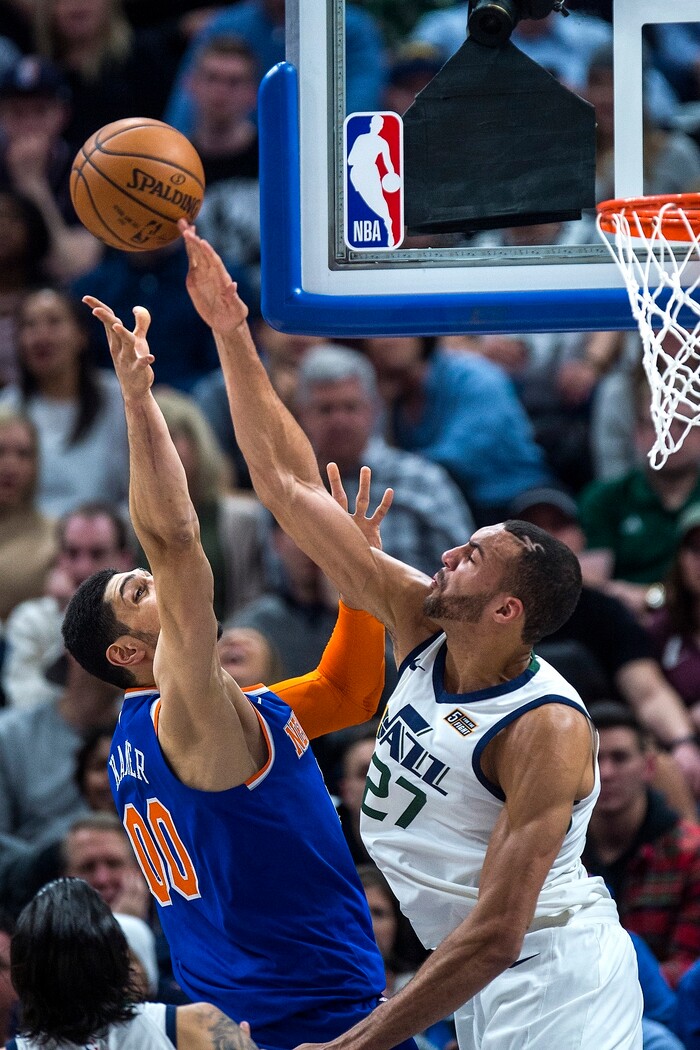 (Chris Detrick  |  The Salt Lake Tribune)  Utah Jazz center Rudy Gobert (27) blocks New York Knicks center Enes Kanter (00) during the game at Vivint Smart Home Arena Friday, January 19, 2018.  