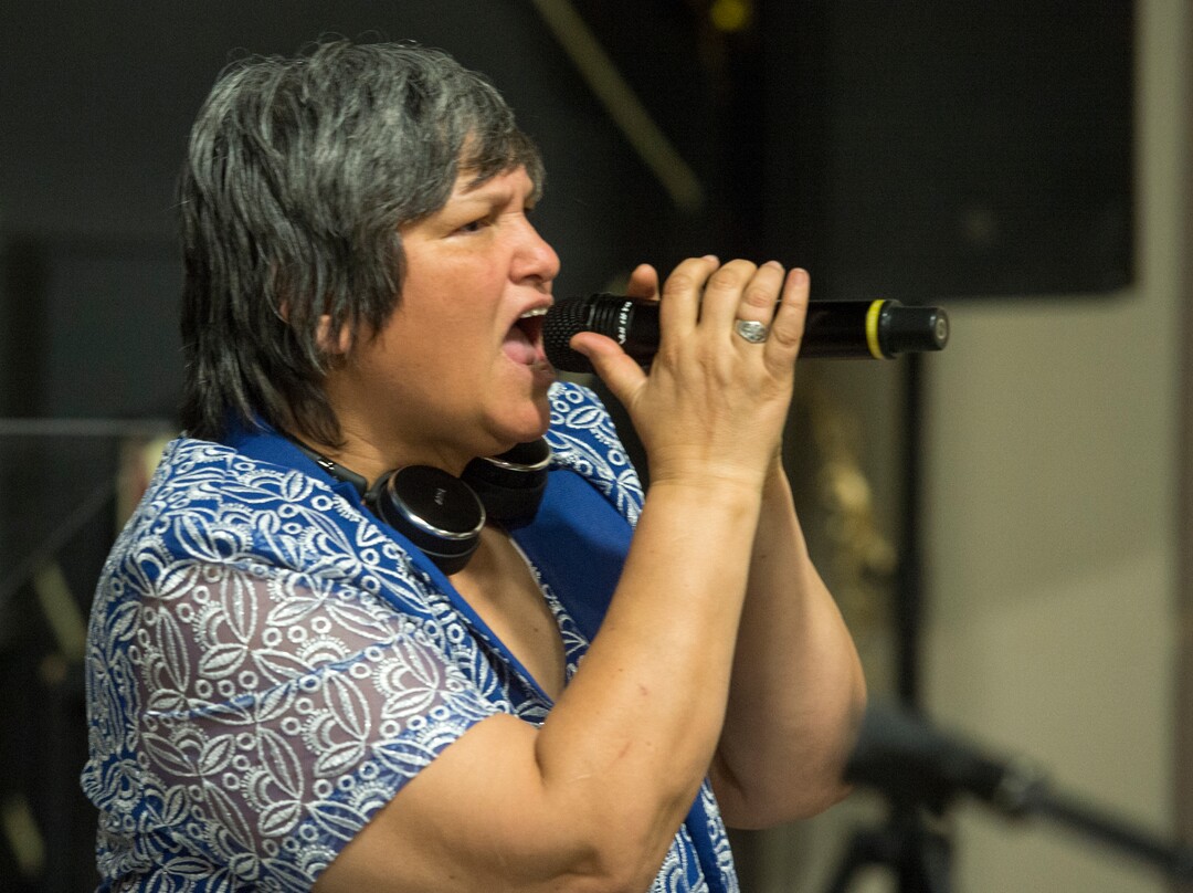 (Rick Egan  |  The Salt Lake Tribune)     Monica Wilson sings during dinner at the 25th Annual Thanksgiving Dinner for the hungry and homeless at the Christian Life Center on Redwood Road in Salt Lake City, Wednesday, Nov. 21, 2018.