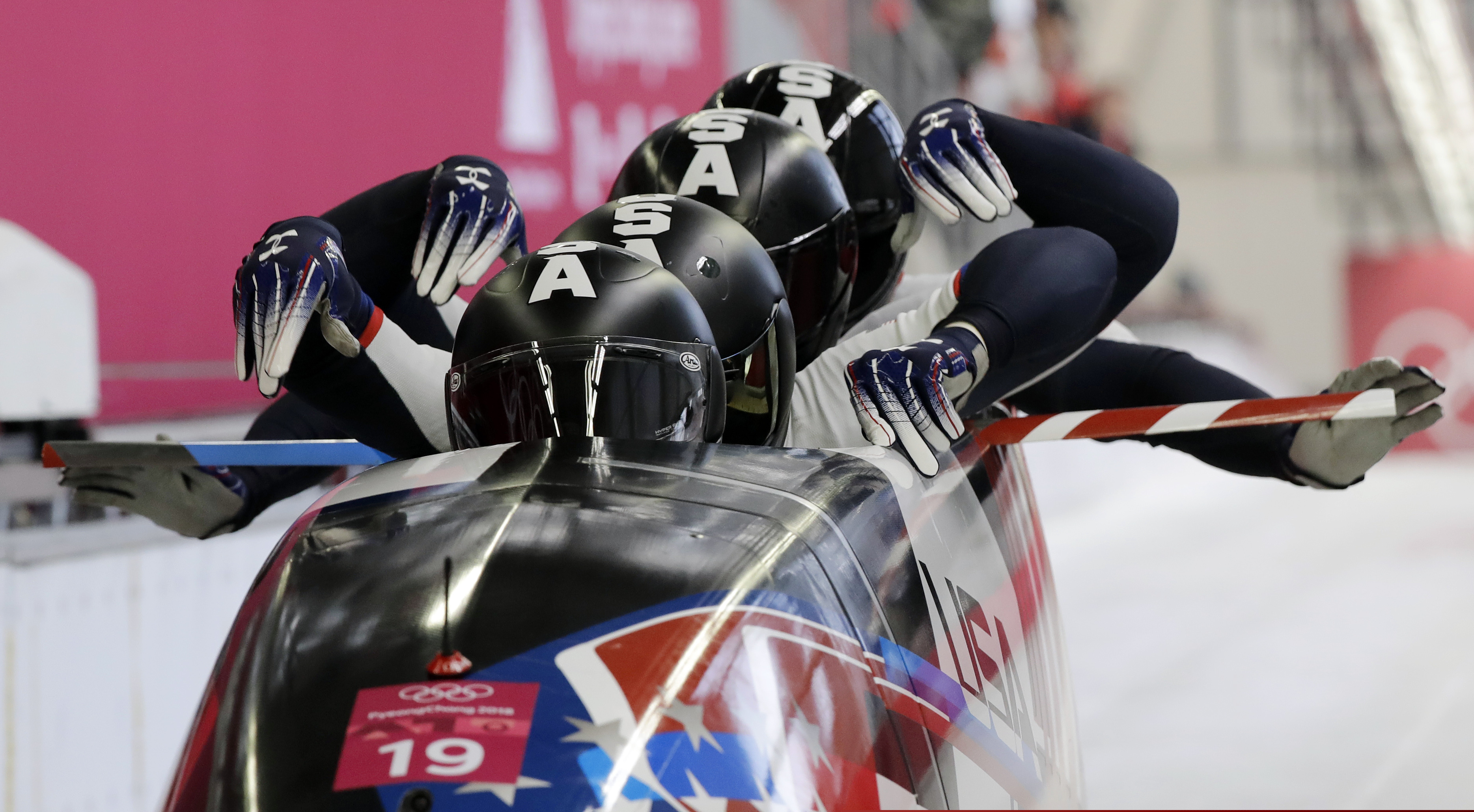 (Wong Maye-E | AP file photo) Driver Justin Olsen and Christopher Fogt, Carlo Valdes and Nathan Weber, of the United States, start their third heat during the four-man bobsled final at the Winter Olympics in Pyeongchang, South Korea, Feb. 25, 2018. USA Bobsled and Skeleton couldn't hit the road recruiting this summer because of the coronavirus pandemic. So, they made Olympic hopefuls come to them and do so online. USABS took its recruiting process digital this year and team officials say it has led to significant upticks in interest.