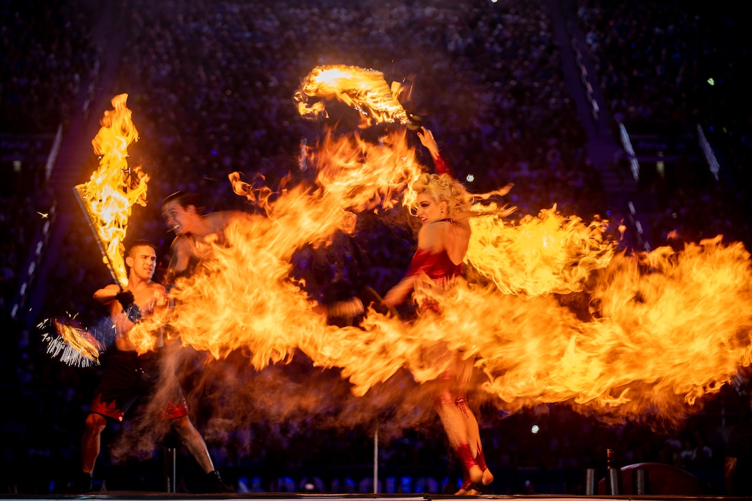 (Trent Nelson  |  The Salt Lake Tribune) Fire dancers perform at Stadium of Fire in Provo on Saturday, July 2, 2022.