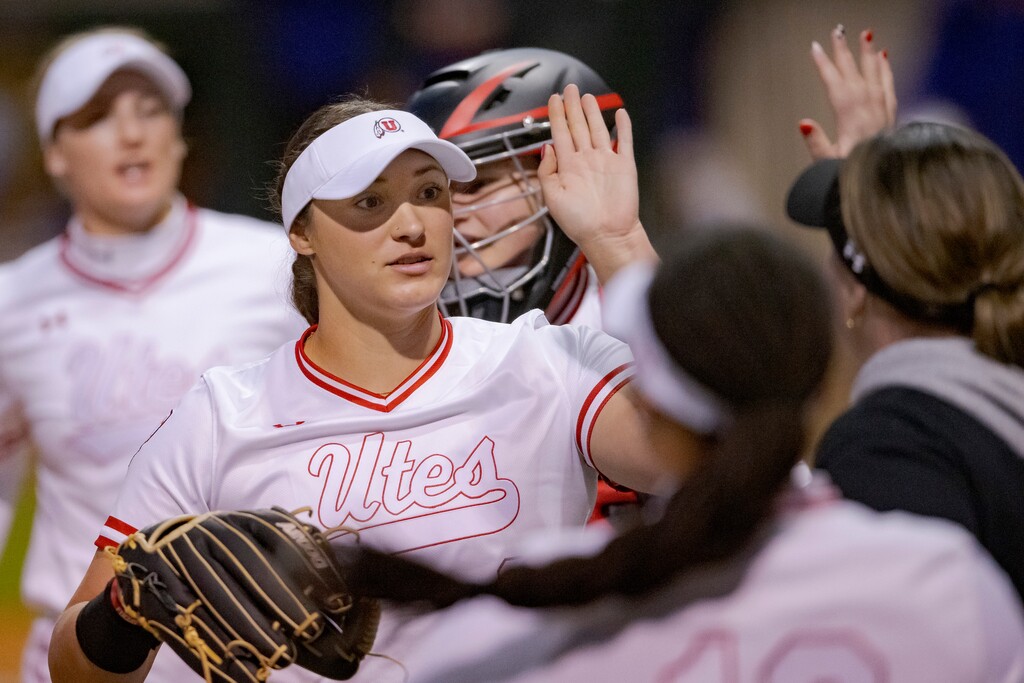 (Matthew Hinton | AP) Utah pitcher Mariah Lopez (8), center, celebrates an out against LSU to end the inning during an NCAA softball game on Saturday, Feb. 18, 2023, in Baton Rouge, La.