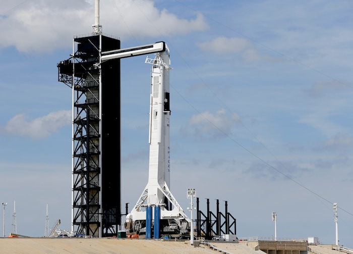 A Falcon 9 SpaceX rocket, ready for launch, sits on pad 39A at the Kennedy Space Center in Cape Canaveral, Fla., Friday, March 1, 2019. The Crew Dragon spacecraft unmanned test flight is scheduled for launch early Saturday morning. (AP Photo/Terry Renna)
